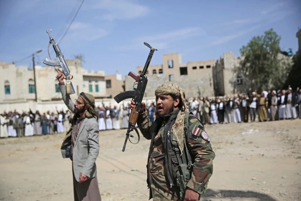 Armed Houthi fighters